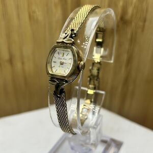 Pierre Michel Vintage 1960s gold tone watch with a white dial,